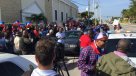 Haitianos protestan y exigen disculpas a Trump en frontis de su propiedad en Florida