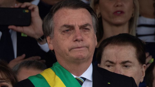  Bolsonaro promulgó ley para que hacendados anden armados  