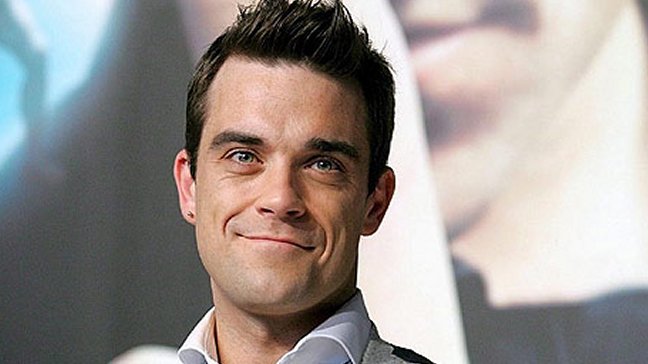 Adele se comprometió a realizar un dueto con Robbie Williams