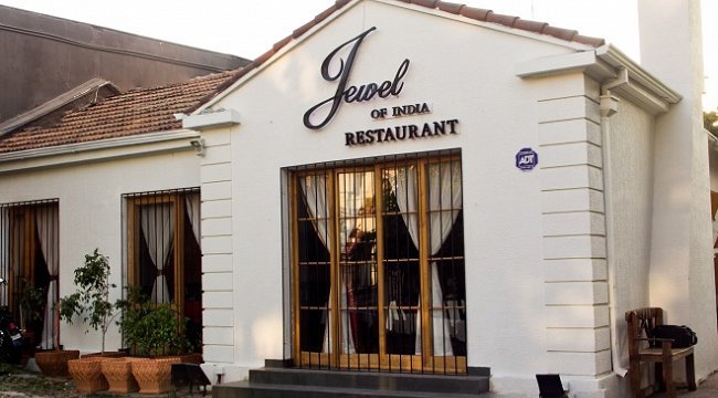 Dueño de restorán de comida india fue detenido por trata de inmigrantes