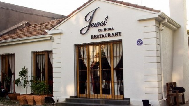 Dueño de restorán de comida india fue detenido por trata de inmigrantes