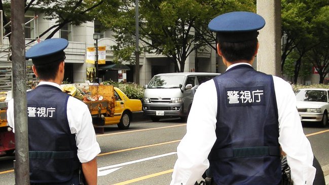 Japonés prendió fuego a su hijo en plena calle