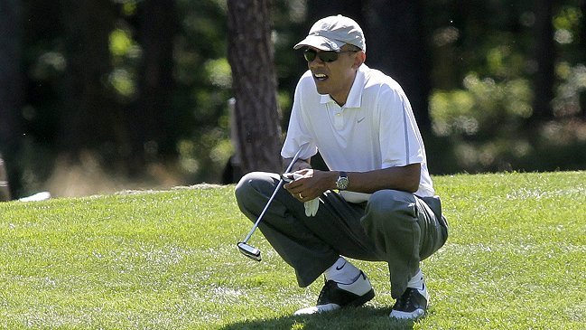 Vacaciones de Obama mezclan playa y golf con preocupaciones internacionales