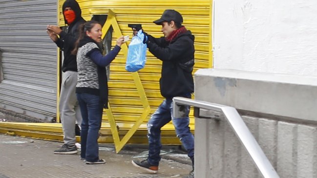 Hombre que amenazó con pistola en medio de saqueos fue formalizado