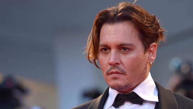 Aplazan el juicio por la entrada ilegal de perros de Johnny Depp en Australia