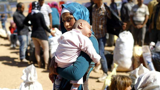 Gobierno dialoga con la Iglesia Católica para concretar el arribo de refugiados sirios