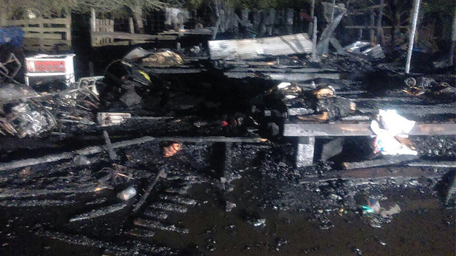 Hombre fue encontrado muerto calcinado y amarrado de pies y manos en Río Bueno