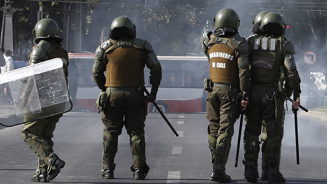 Aplazan para el lunes formalización de carabinero que disparó a manifestante en Concepción