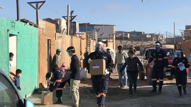 Entregan kits de aseo en campamentos de Alto Hospicio