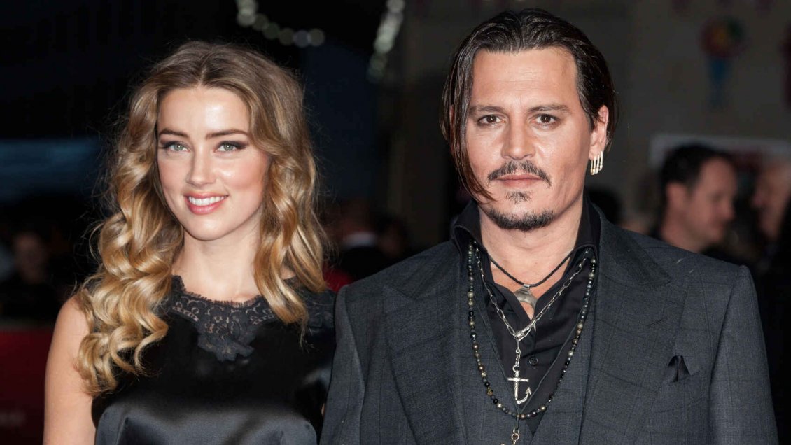 Aseguran que Johnny Depp intentó sacar a Amber Heard de 