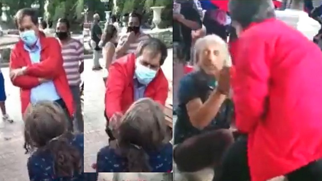 Polémica por video que muestra a alcalde dándole cachetada a un hombre sentado