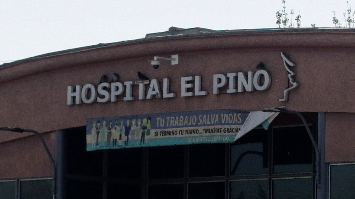 PDI indaga muerte de joven que fue abandonado con un disparo en la cabeza en el Hospital El Pino