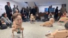 Robots con caras humanas que crean arte en su "modo caca"